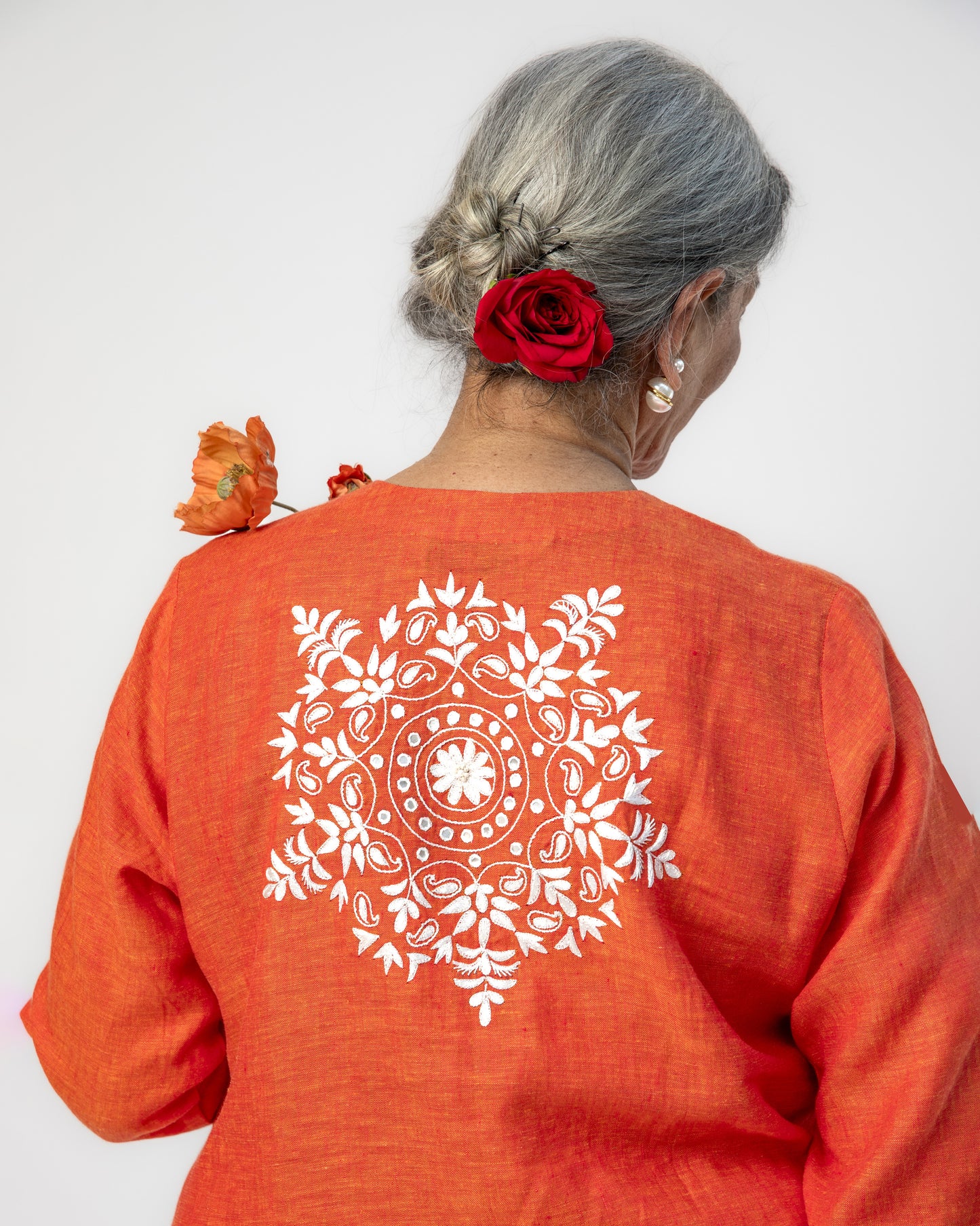 Pure Linen A-Line Orange Kurta With White Hand Embroidery and Mirror Highlight on Neck, Sleeves and Back