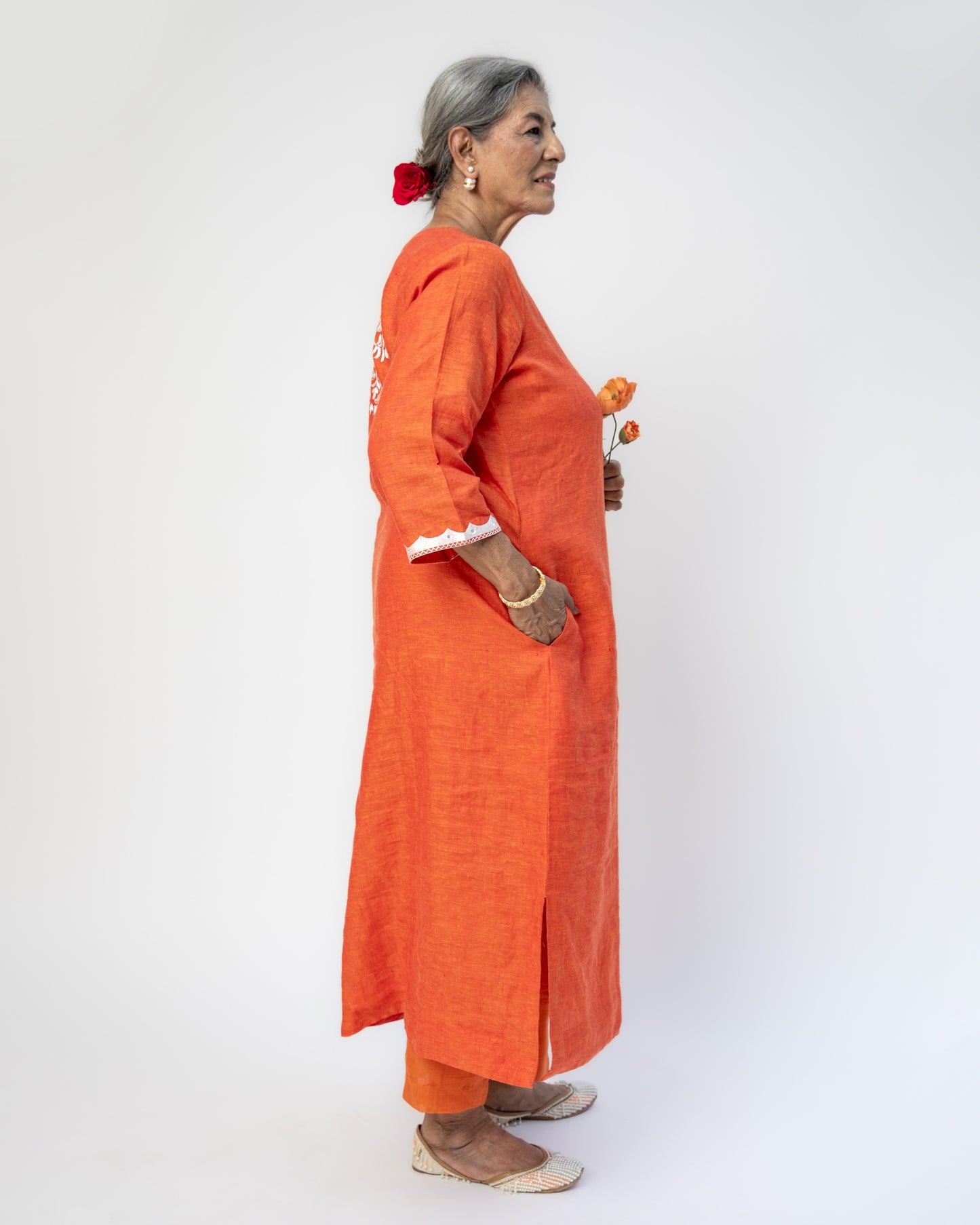 Pure Linen A-Line Orange Kurta With White Hand Embroidery and Mirror Highlight on Neck, Sleeves and Back